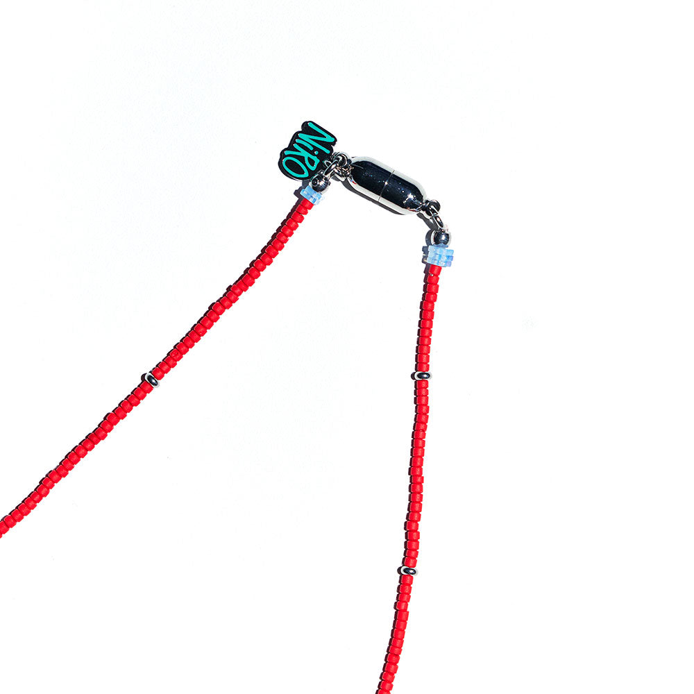 RED POiNT MOLAR DOLPHiN NECKLACE #130